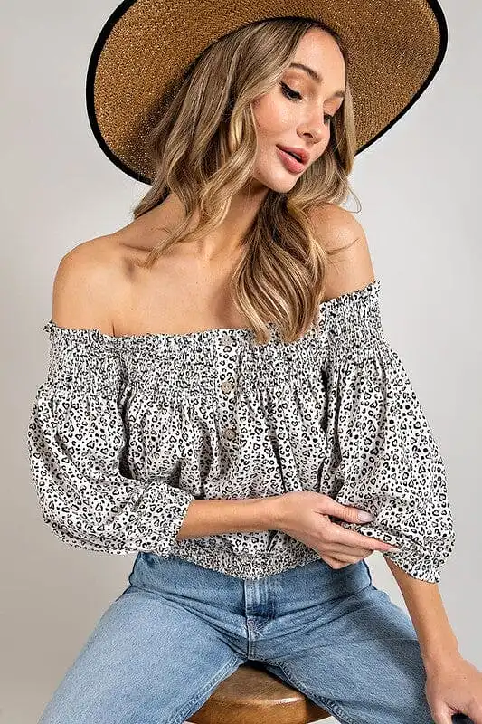 ANIMAL PRINT SMOCKED OFF THE SHOULDER TOP